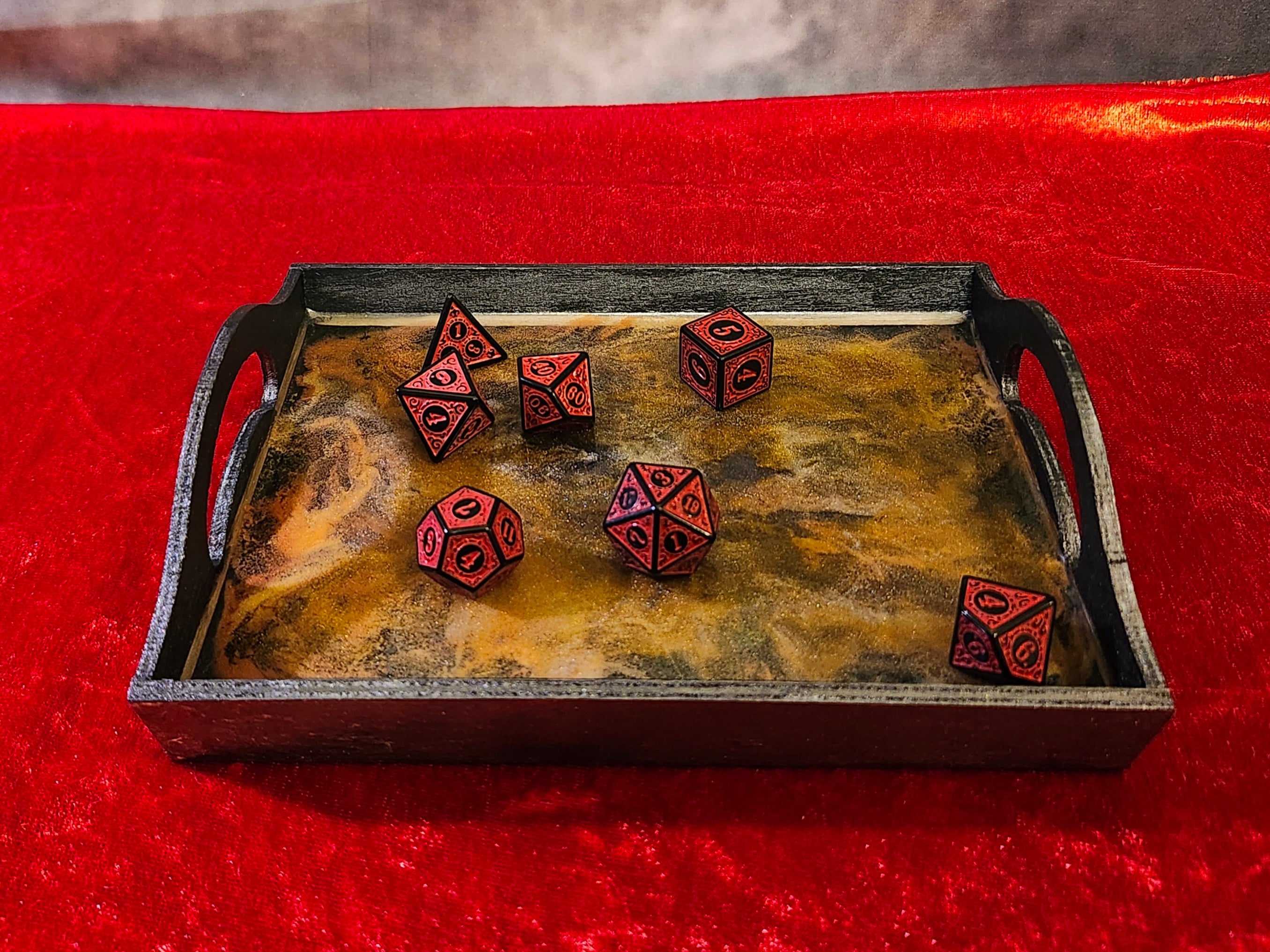 Premium cosmic nebula resin dice tray featuring a metallic gold and deep copper galaxy swirl rolling surface encased in deep wooden walls with built-in handles.