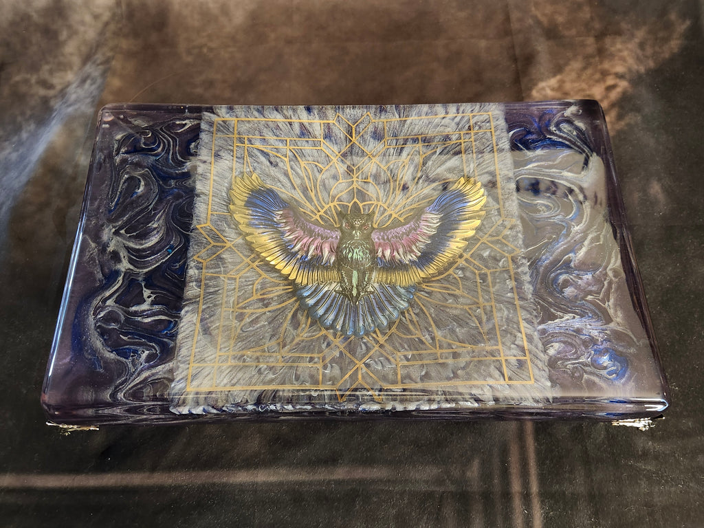 Solid hand-poured 3D resin fantasy art panel featuring a detailed gold geometric owl spirit on a metallic purple and midnight blue swirling fluid art background.